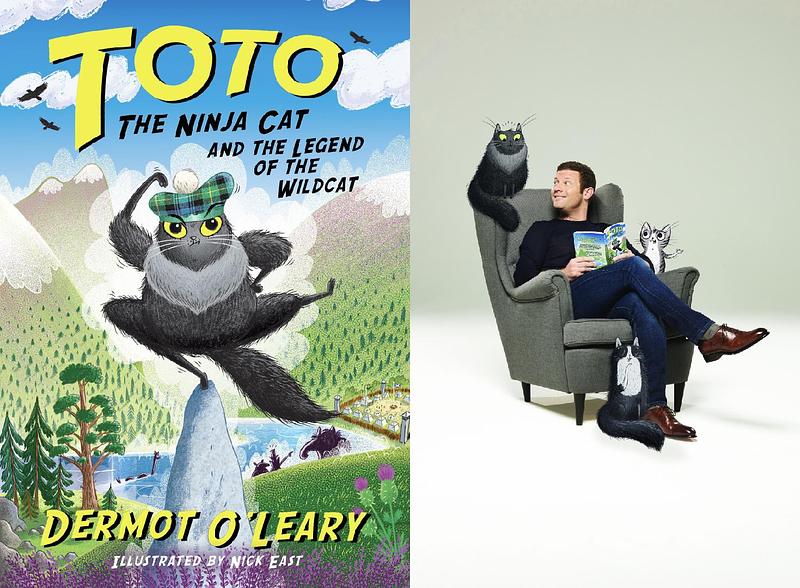 Front cover of Toto the Ninja Cat and the Legend of the Wildcat with Dermot O'Leary sat reading it